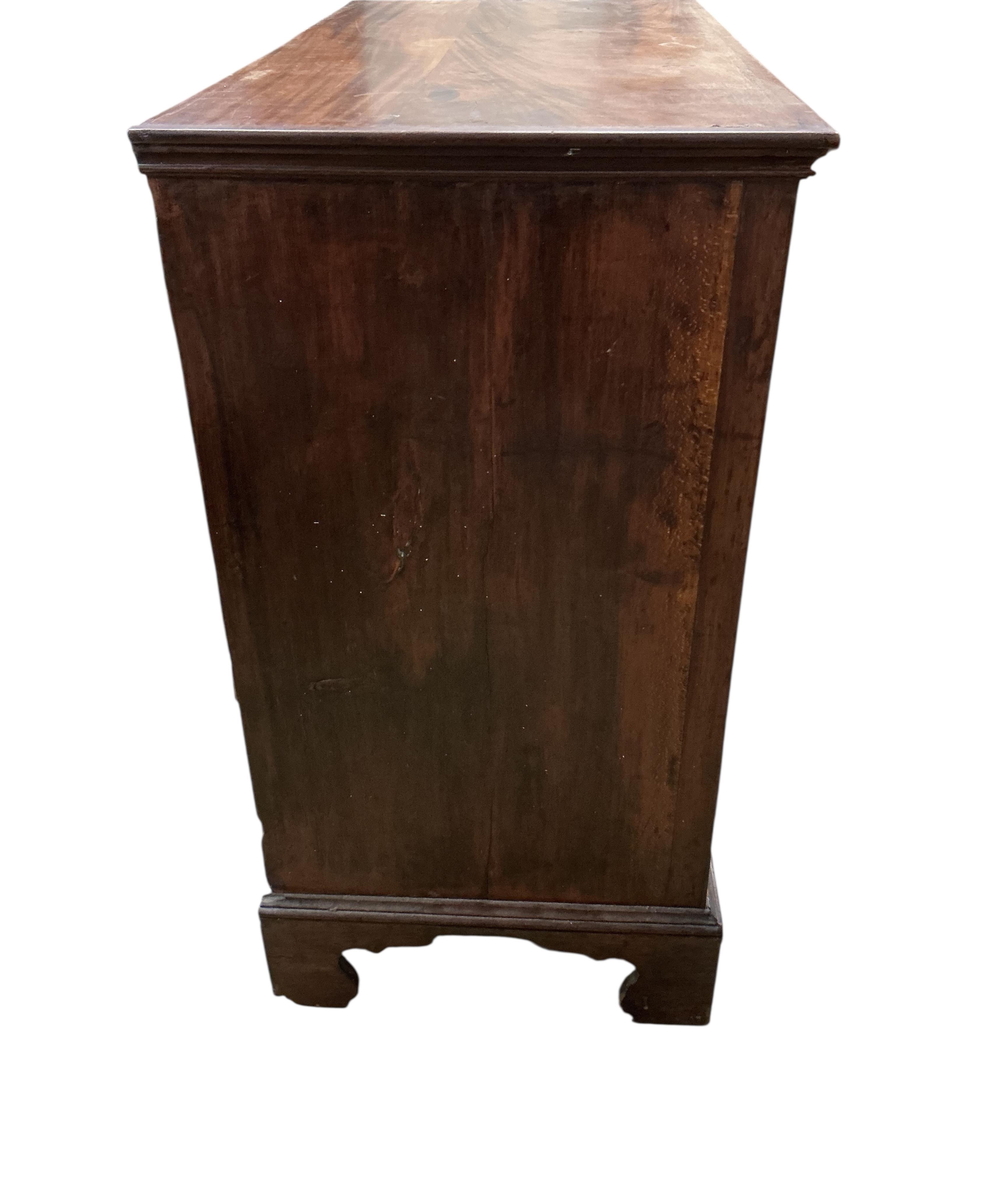 A George III mahogany chest of four long drawers, on bracket feet, width 95cm, depth 49cm, height 94cm